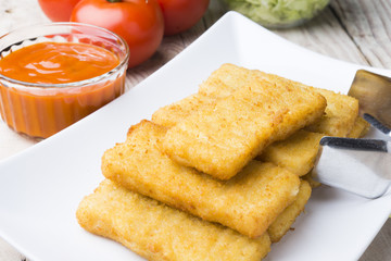 Meat croquettes served with fresh vegetables.