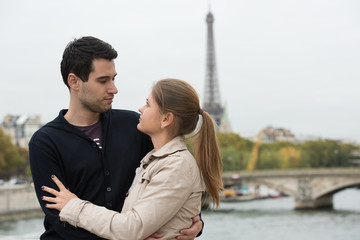 young couple in Paris hugging