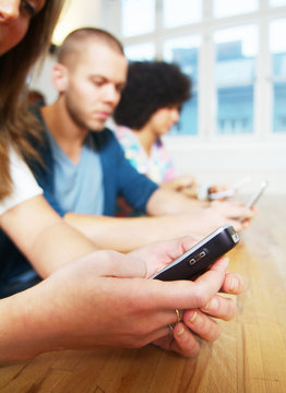 Three in a row with cellphones
