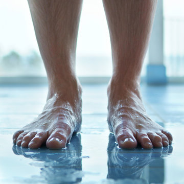 Feet on the edge of the pool
