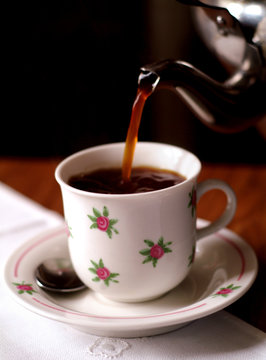 Caffee poured into coffee cup
