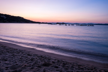 Fototapeta premium Sunset at the beach in the sea of Sardinia
