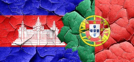 Cambodia flag with Portugal flag on a grunge cracked wall