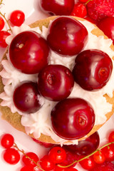 Closeup of cupcake with cherries