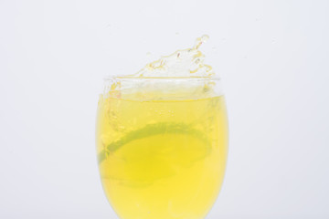 Naklejka na ściany i meble Lemonade in a glass.Isolated on white.