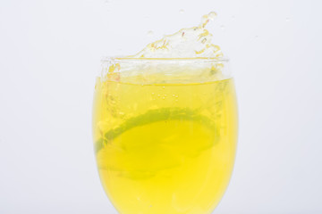 Naklejka na ściany i meble Lemonade in a glass.Isolated on white.
