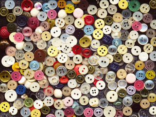 Lot of colorful plastic clothing buttons. Vintage