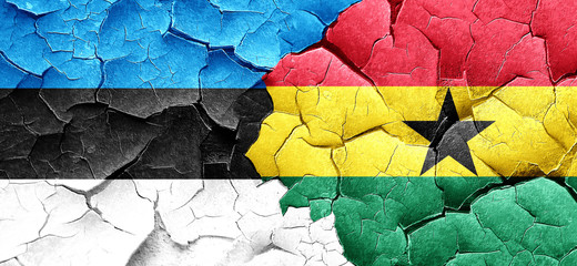 estonia flag with Ghana flag on a grunge cracked wall