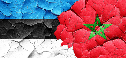 estonia flag with Morocco flag on a grunge cracked wall