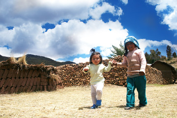 Two little latin girls in the countryside
