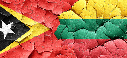 east timor flag with Lithuania flag on a grunge cracked wall