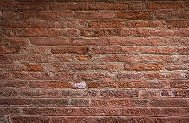 Old    brick wall in Venice, Italy