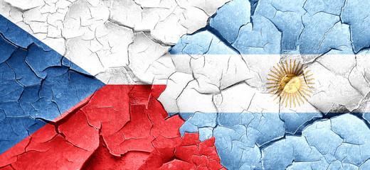 czechoslovakia flag with Argentine flag on a grunge cracked wall