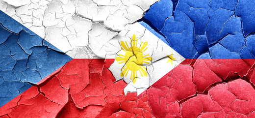 czechoslovakia flag with Philippines flag on a grunge cracked wa