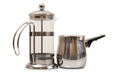 Metal and glass pots for coffee on a white background