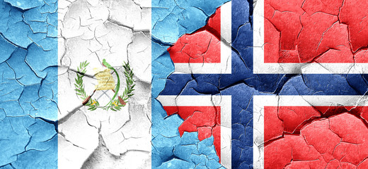 guatemala flag with Norway flag on a grunge cracked wall