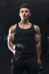 Bodybuilder with dumbbell