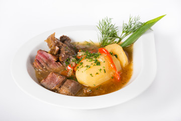 Beef stew in white plate
