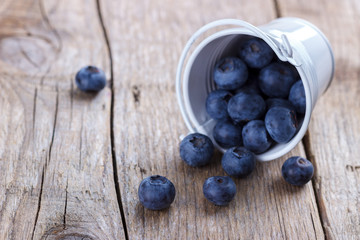 Ripe blueberries in a bucket