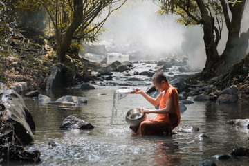 monk play water