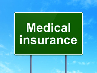 Insurance concept: Medical Insurance on road sign background