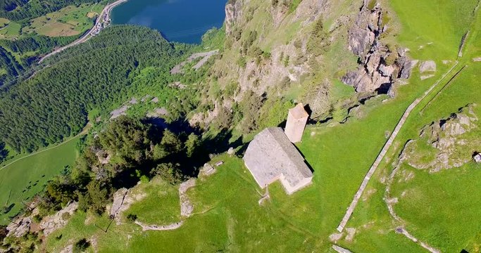Aerial 4k - Chiesetta di San Romerio (1106) - Valle di Poschiavo - Canton Grigioni - Svizzera 