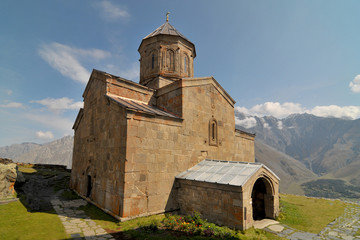 Fototapeta na wymiar Gergeti Trinity Church near the village of Gergeti in Georgia.