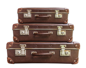 Three vintage brown suitcase on white background