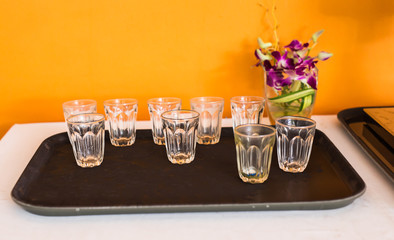 empty glasses on the tray