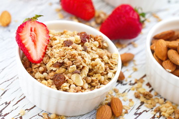 Oat granola with almond, chocolate and fresh strawberry