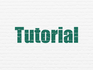 Obraz premium Education concept: Tutorial on wall background