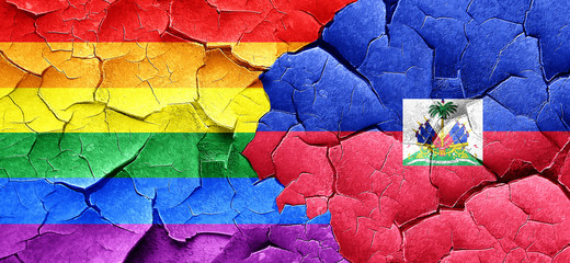 Gay pride flag with Haiti flag on a grunge cracked wall