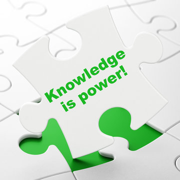 Studying concept: Knowledge Is power! on puzzle background