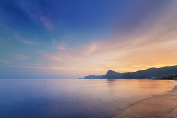 sunset on a background of mountains