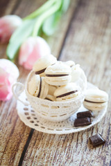 Vanilla macarons with chocolate ganache