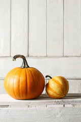 Pumpkins on wooden table