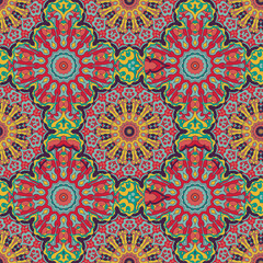 Seamless ethnic pattern with mandala.