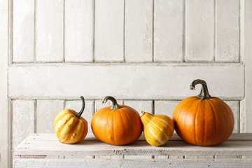 Pumpkins on wooden table