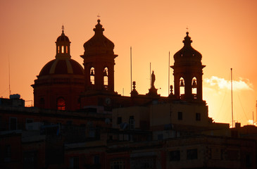 Fototapeta na wymiar Isla Basilica at sunset, Senglea, Malta