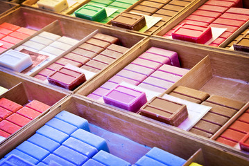 Choice of colorful french soaps on a market