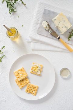 Crackers with gorgonzola and herb and white sweet wine  jelly