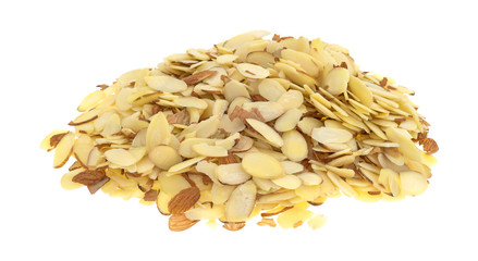 Large portion of sliced almonds isolated on a white background side view.