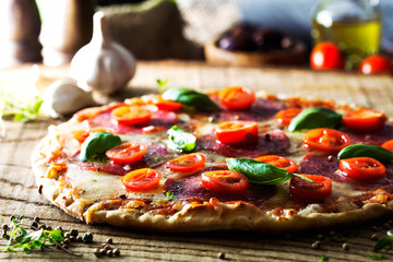 Fresh pizza on wood