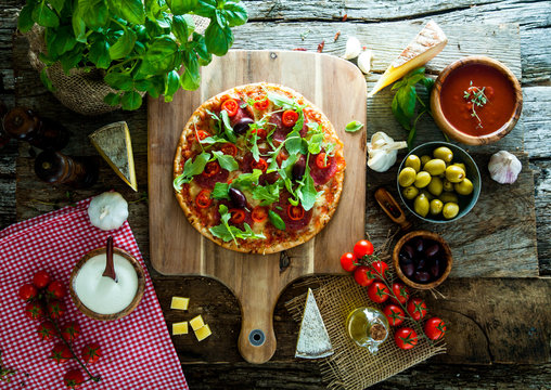 Fresh pizza on wood