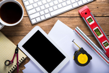 engineering objects on wooden table. top view