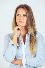 Fototapeta na wymiar Portrait einer jungen Geschäftsfrau / zeigt Emotionen