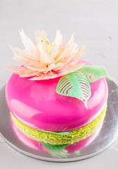 Bright pink mousse cake with mirror glaze