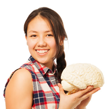 Asian 15 Years Old Girl Holding Cerebrum Model