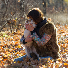 woman with a dog on holiday