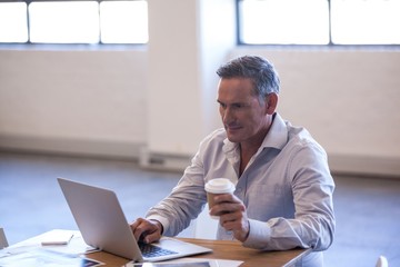 Businessman working on his laptop